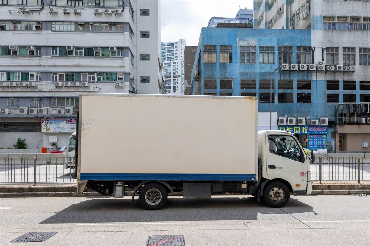Moving truck parked at the kerb